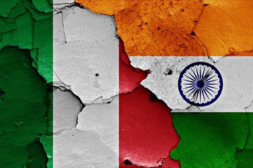 flags of Italy and India painted on cracked wall