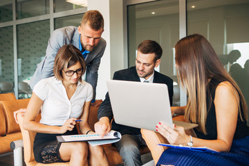 Businesspeople Having Meeting In Modern Office