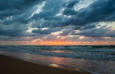 sea waves on the sunset background