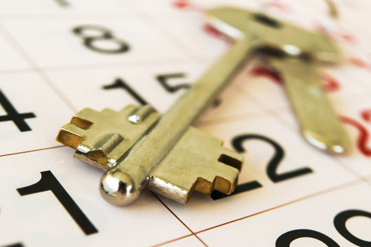 The keys to the apartment, and calendar. The concept of mortgage lending .