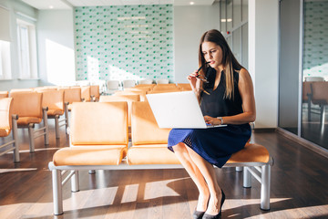 beautiful businesswoman using laptop