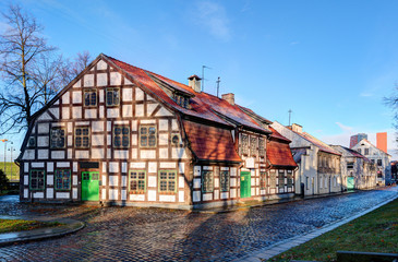 Fototapeta na wymiar Vintage half-timbered residential house. Old town district, Klaipeda. Lithuania.