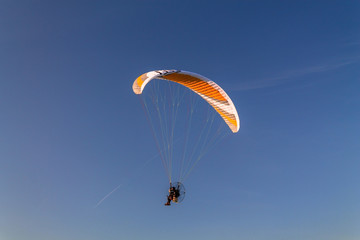 Man with motor paragliding 