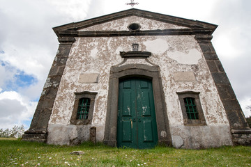 Naklejka premium Chapel on trevim hilltop