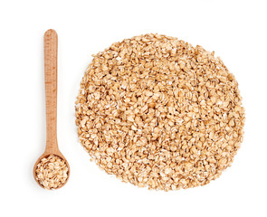 Pile of oats and wooden spoon on white background. Healthy food. Close up, high resolution product.