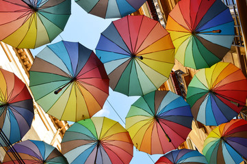 Colorful umbrellas in the sky - Victoriei passage in Bucharest city centre, Romania