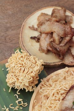 Instant noodles at blanched with baked pork delicious.