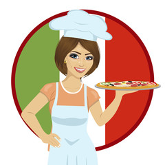 female chef holding pizza on tray standing over italian flag