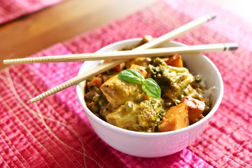 Delicious asian food or indian curry with chopsticks and selective focus. Close-up shot with high angle view.