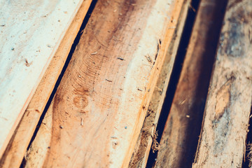 Large stack of wood planks