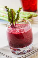 Fresh beet juice with leaves in a glass