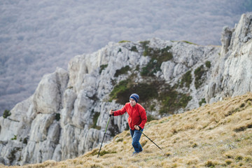 Difficult hike with trekking poles