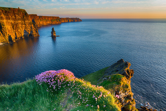  Irish world famous tourist attraction in County Clare. The Cliffs of Moher West coast of Ireland. Epic Irish Landscape and Seascape along the wild atlantic way. Beautiful scenic nature from Ireland.