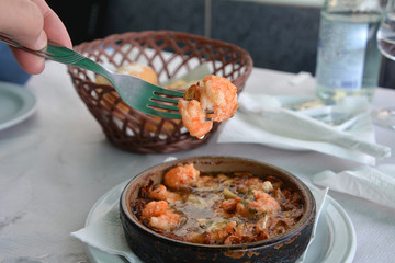 Sizzling prawns with garlic. Traditional Spanish tapas dish.