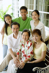 Family looking up at camera, portrait