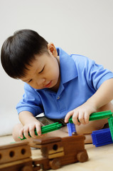 Boy playing with toys