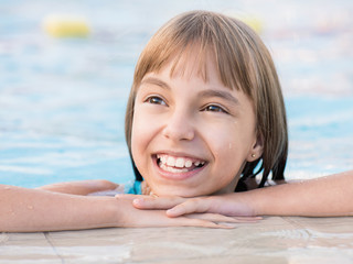 Happy girl in pool