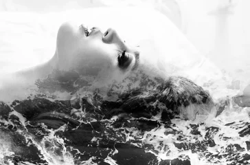 Monochrome double exposure of girl profile portrait and sea foam © patronestaff
