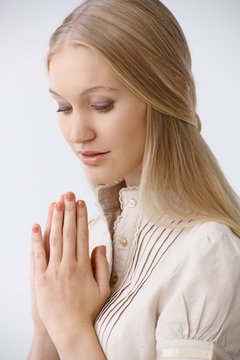 Portrait of praying woman