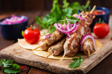Minced Lula kebab grilled turkey (chicken) with vegetables.