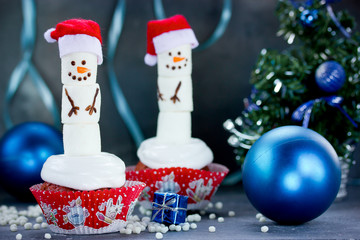 Christmas cupcakes with marshmallow snowman