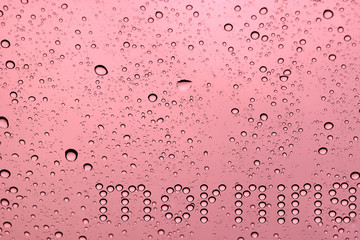 abstract water drop on windshield or water drop on orange backgr