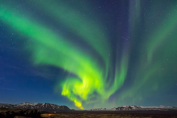 Fototapeta na wymiar Aurora borealis over the Thingvellir National Park - Iceland