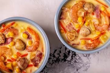 Homemade clam chowder with shrimps.