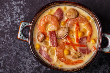 Homemade clam chowder with shrimps.
