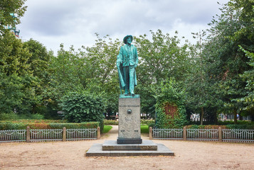 Statue of the danish writer and poet Holger Drachmann, standing in a small park on Alle Gade on...
