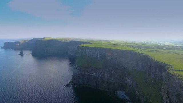 Mountain cliffs and the sea in the Cliffs of Moher found in West Ireland one of the most visited place in Ireland