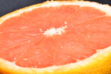 One half of pink grapefruit