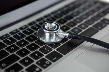 Stethoscope on laptop