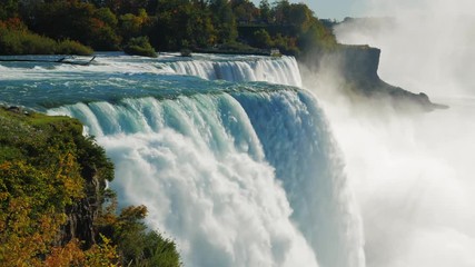 The famous waterfall Niagara Falls, a popular spot among tourists from all over the world. The view from the American side. In the picture, one can see at once two waterfalls ProRes HQ 422 10 bit