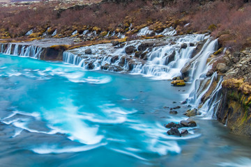 Hraunfossar and Barnafossar Waterfall in Iceland