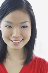 Woman smiling at camera, head shot