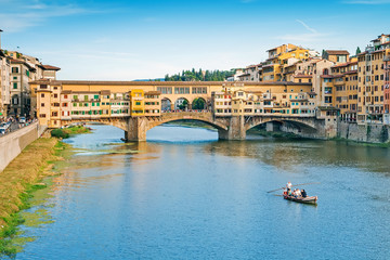 Ponte Vecchio on the river Arno in Florence, Italy - obrazy, fototapety, plakaty