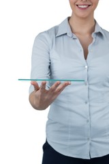 Businesswoman pretending to hold digital tablet