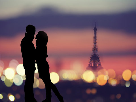 Silhouette Of Romantic Lovers With Eiffel Tower On A Background In Paris , France