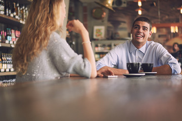 Two friends talking in the cafe
