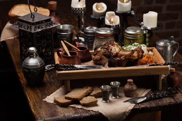 Grilled pork knuckle with sauerkraut. For a big company