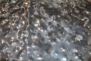Forged metal surface with bulges