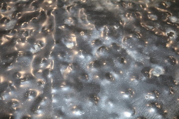 Forged metal surface with bulges