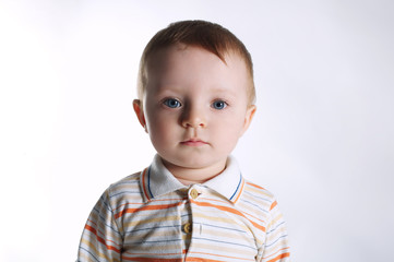 little beautiful boy on bright background