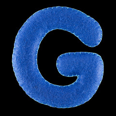 G- letter from blue felt. Collection of colorful handmade English alphabet isolate on black...