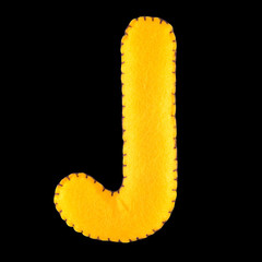 J- letter from yellow felt. Collection of colorful handmade English alphabet isolate on black...