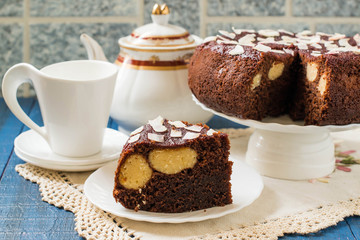 Homemade chocolate cake with curd-coconut balls