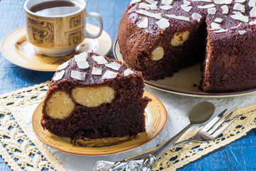 Homemade chocolate cake with curd-coconut balls