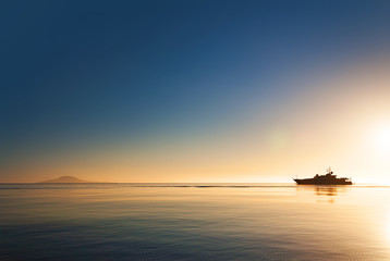 Silhouette of a luxurious yacht on the sea of cortez  at sunset - 126571599