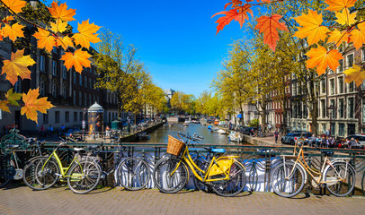 Bikes on the bridge in  Amsterdam, Netherlands. Canals of Amsterdam